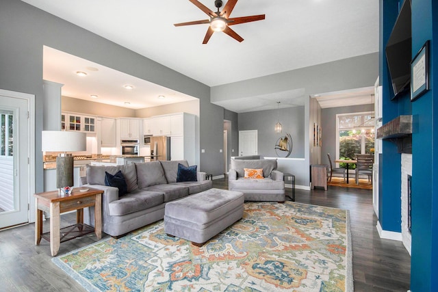 172 Bay Meadows Dr, Holland, MI 49424 - living area with a ceiling fan and dark wood-style floors