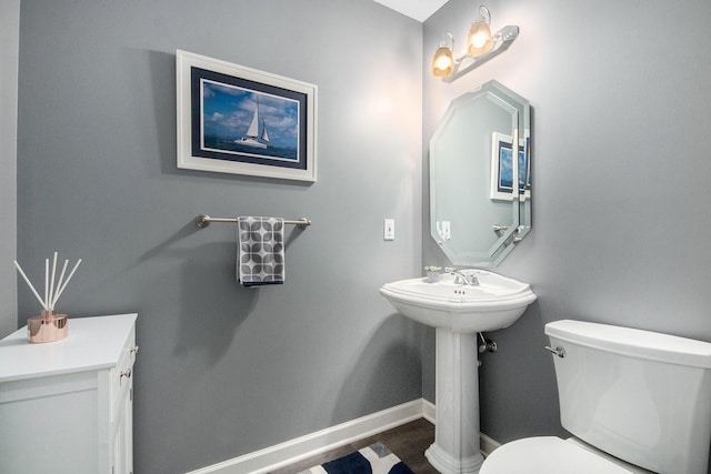 172 Bay Meadows Dr, Holland, MI 49424 - bathroom featuring toilet and baseboards