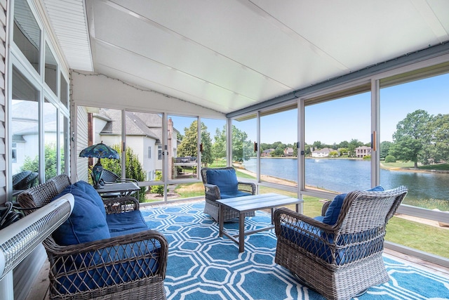 172 Bay Meadows Dr, Holland, MI 49424 - sunroom featuring a water view and vaulted ceiling