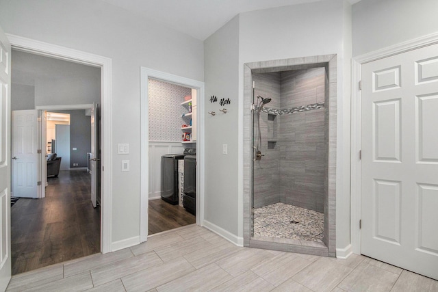 172 Bay Meadows Dr, Holland, MI 49424 - bathroom featuring a shower stall and wood finish floors