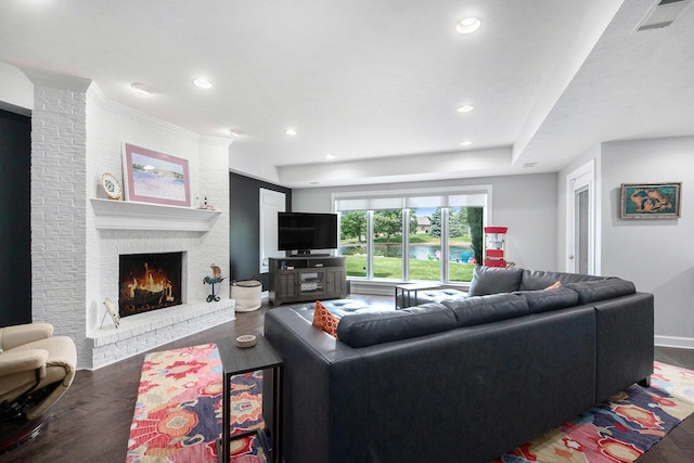 172 Bay Meadows Dr, Holland, MI 49424 - living area with wood finished floors, recessed lighting, and a brick fireplace