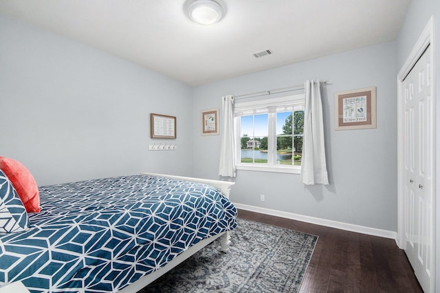 172 Bay Meadows Dr, Holland, MI 49424 - bedroom with wood finished floors and a closet