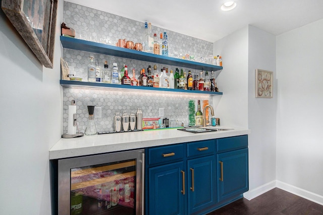 172 Bay Meadows Dr, Holland, MI 49424 - indoor wet bar featuring wine cooler, dark wood-style flooring, tasteful backsplash, and recessed lighting