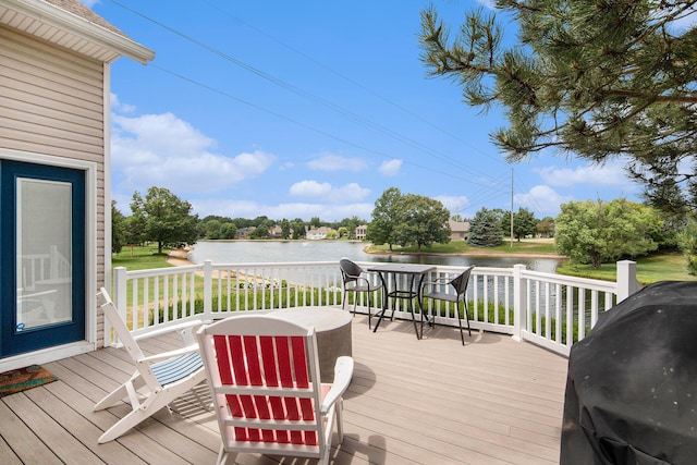 172 Bay Meadows Dr, Holland, MI 49424 - wooden terrace featuring a water view and a grill
