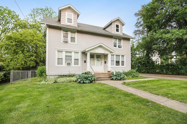 1019/1021 N Michigan Ave, Howell, MI 48843 - american foursquare style home featuring a shingled roof