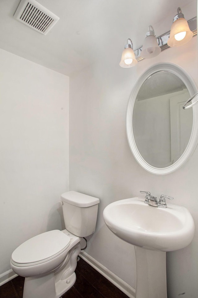 2817 Hartwick Dr, Rochester Hills, MI 48307 - bathroom with toilet and baseboards