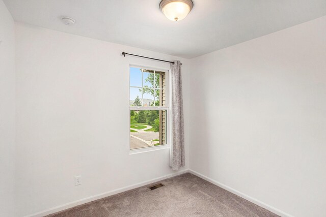 2817 Hartwick Dr, Rochester Hills, MI 48307 - unfurnished room with light carpet and a smoke detector