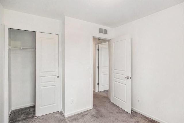 2817 Hartwick Dr, Rochester Hills, MI 48307 - unfurnished bedroom with light carpet and a closet