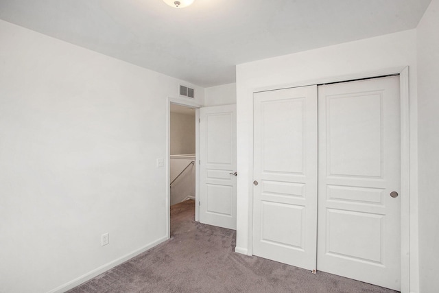 2817 Hartwick Dr, Rochester Hills, MI 48307 - unfurnished bedroom featuring carpet and a closet