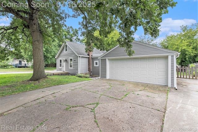 21801 Colgate St, Farmington Hills, MI 48336 - view of side of home featuring a detached garage