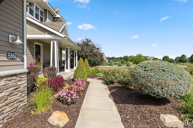 5362 Settlers Grove Rd NE, Belmont, MI 49306 - view of yard featuring covered porch