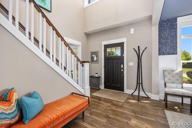 5362 Settlers Grove Rd NE, Belmont, MI 49306 - foyer entrance with wood finished floors and stairs