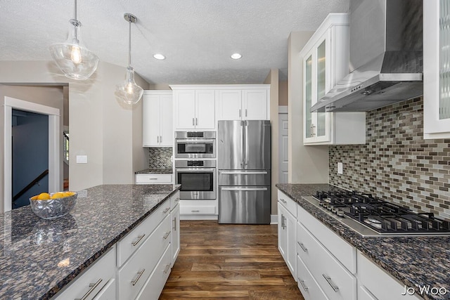5362 Settlers Grove Rd NE, Belmont, MI 49306 - kitchen featuring stainless steel appliances, wall chimney range hood, dark wood-style flooring, a textured ceiling, and white cabinets