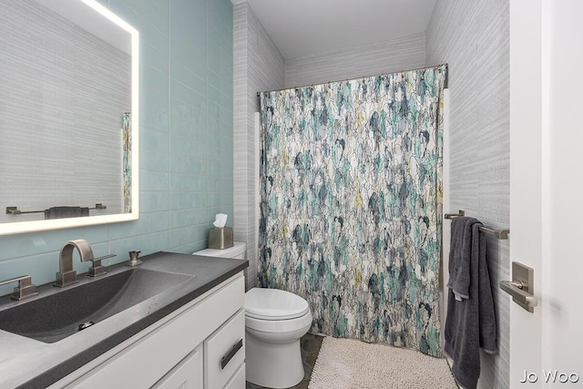 5362 Settlers Grove Rd NE, Belmont, MI 49306 - full bath featuring vanity, tile walls, backsplash, and a shower with curtain