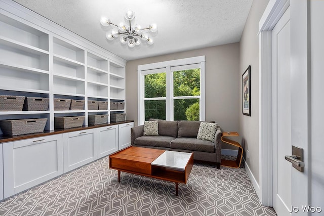 5362 Settlers Grove Rd NE, Belmont, MI 49306 - living area with a chandelier and a textured ceiling