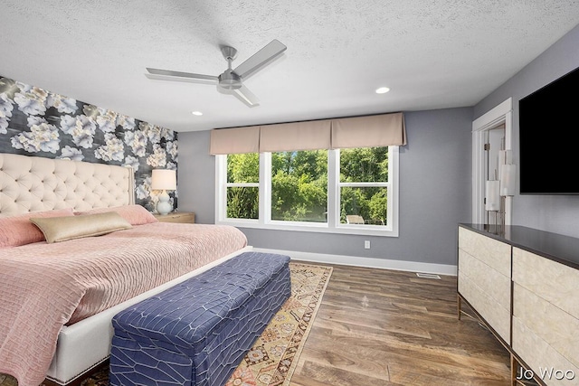 5362 Settlers Grove Rd NE, Belmont, MI 49306 - bedroom with a textured ceiling, wood finished floors, recessed lighting, and ceiling fan