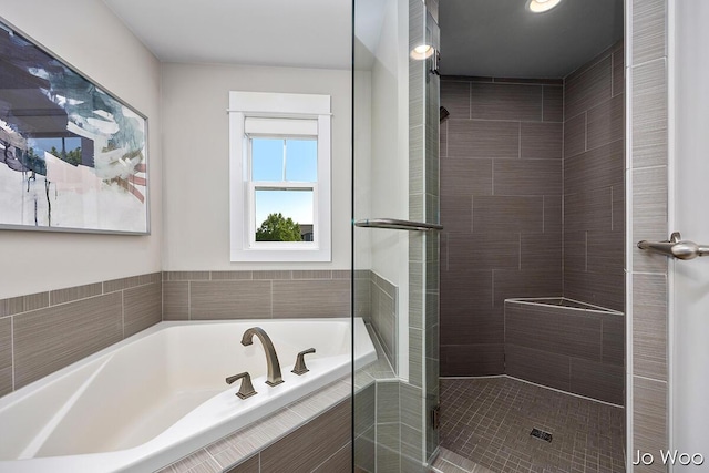 5362 Settlers Grove Rd NE, Belmont, MI 49306 - bathroom featuring a garden tub and a shower stall