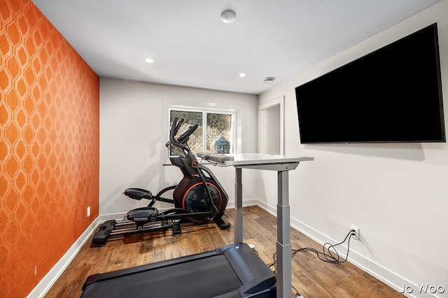 5362 Settlers Grove Rd NE, Belmont, MI 49306 - workout area with an accent wall, wood finished floors, recessed lighting, and wallpapered walls