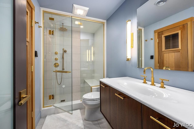 5362 Settlers Grove Rd NE, Belmont, MI 49306 - bathroom with vanity, a shower stall, and tile patterned flooring