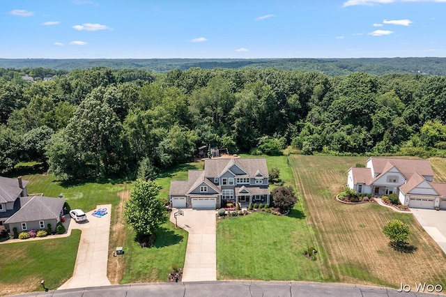 5362 Settlers Grove Rd NE, Belmont, MI 49306 - aerial view of property and surrounding area featuring a heavily wooded area
