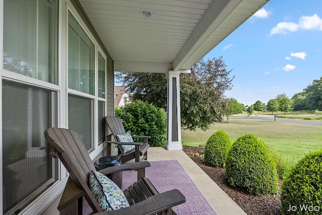 5362 Settlers Grove Rd NE, Belmont, MI 49306 - porch with a lawn