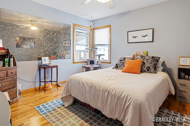 302 W 22nd St, Holland, MI 49423 - bedroom featuring wood finished floors and ceiling fan