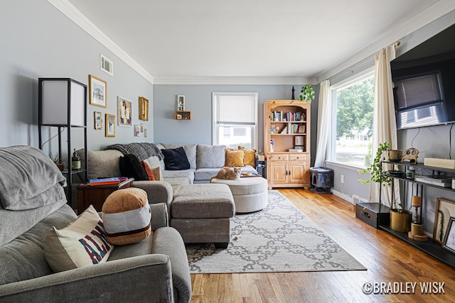 302 W 22nd St, Holland, MI 49423 - living area featuring crown molding and wood finished floors