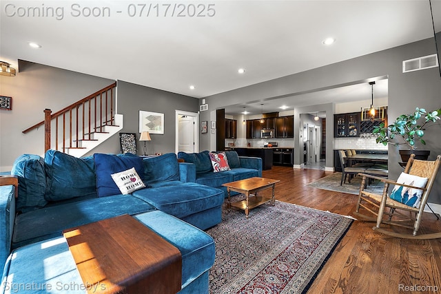 1120 Wyandotte Ave, Royal Oak, MI 48067 - living area featuring dark wood-type flooring, stairway, and recessed lighting
