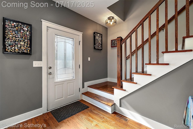 1120 Wyandotte Ave, Royal Oak, MI 48067 - entryway featuring wood finished floors and stairs