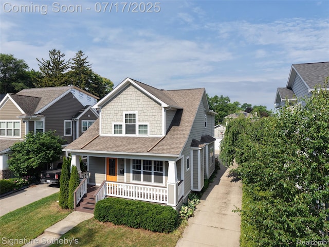 1120 Wyandotte Ave, Royal Oak, MI 48067 - view of front of house featuring covered porch, a shingled roof, and concrete driveway