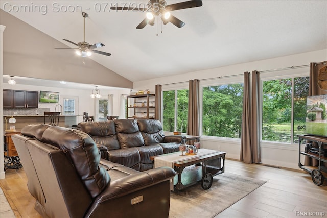1847 Brandy Ln, Brighton, MI 48114 - living area with ceiling fan, light wood-style floors, and lofted ceiling