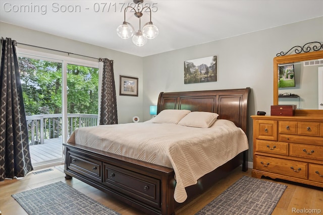 1847 Brandy Ln, Brighton, MI 48114 - bedroom featuring access to exterior and light wood finished floors