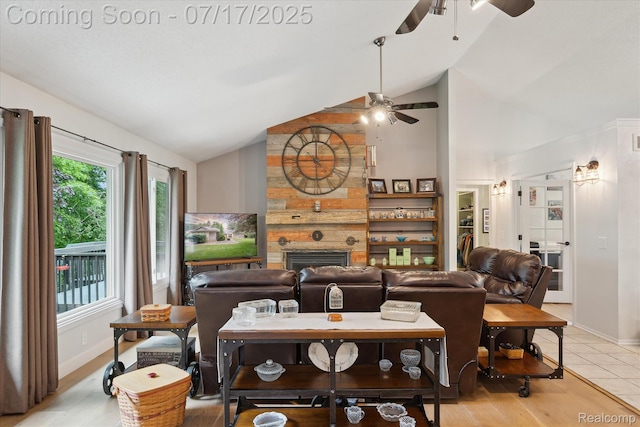 1847 Brandy Ln, Brighton, MI 48114 - living room featuring ceiling fan, a large fireplace, light wood-type flooring, and high vaulted ceiling
