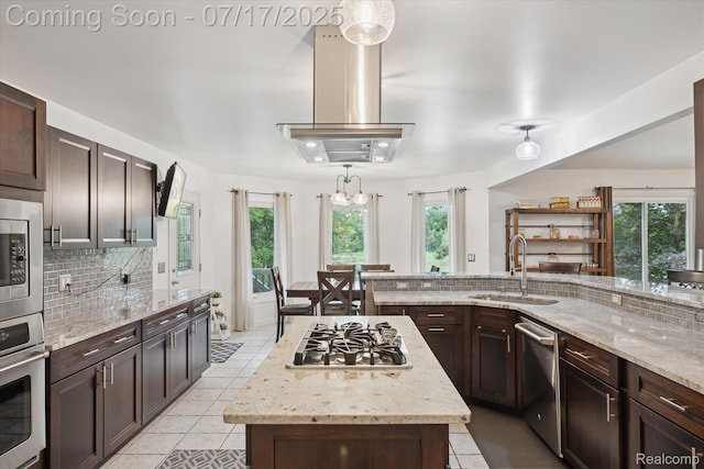 1847 Brandy Ln, Brighton, MI 48114 - kitchen with light tile patterned flooring, appliances with stainless steel finishes, and plenty of natural light