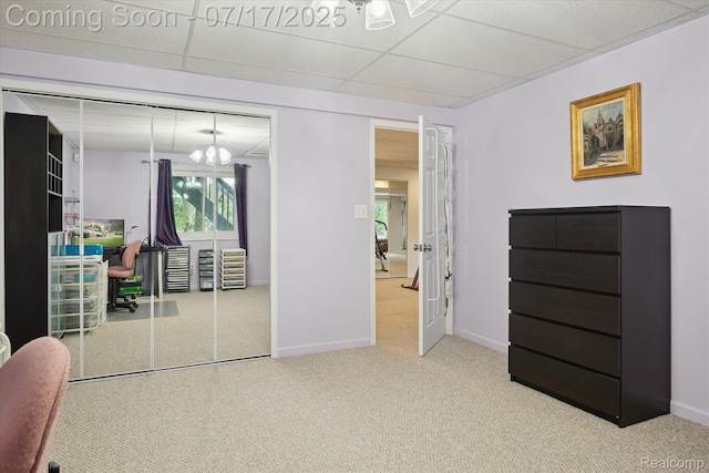 1847 Brandy Ln, Brighton, MI 48114 - carpeted bedroom with a drop ceiling, a closet, and a chandelier