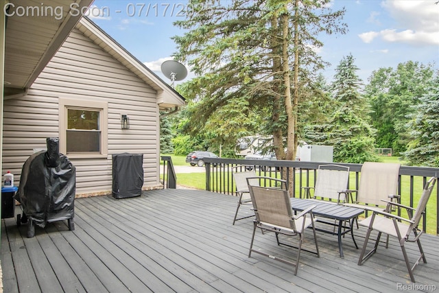 1847 Brandy Ln, Brighton, MI 48114 - wooden terrace with area for grilling and outdoor dining space