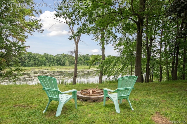 1847 Brandy Ln, Brighton, MI 48114 - view of grassy yard with a fire pit and a water view