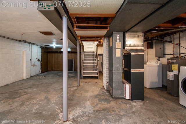 43 Charlevoix St, Clawson, MI 48017 - unfinished below grade area featuring washer / clothes dryer, electric water heater, electric panel, stairs, and heating unit