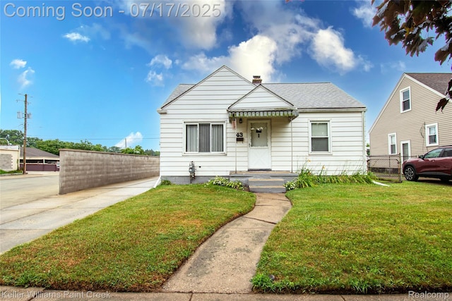 43 Charlevoix St, Clawson, MI 48017 - bungalow-style house with a chimney