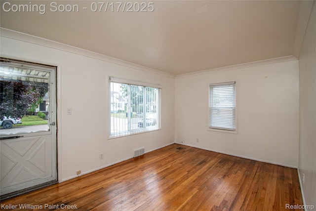 43 Charlevoix St, Clawson, MI 48017 - spare room with hardwood / wood-style flooring, plenty of natural light, and ornamental molding