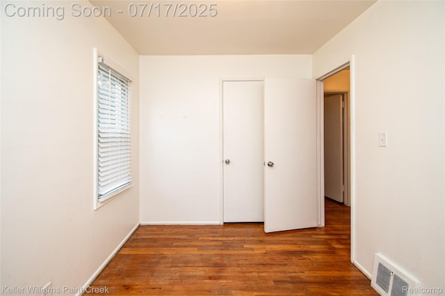 43 Charlevoix St, Clawson, MI 48017 - unfurnished bedroom featuring wood finished floors and multiple windows