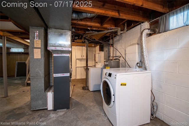 43 Charlevoix St, Clawson, MI 48017 - washroom with washer and clothes dryer and electric water heater