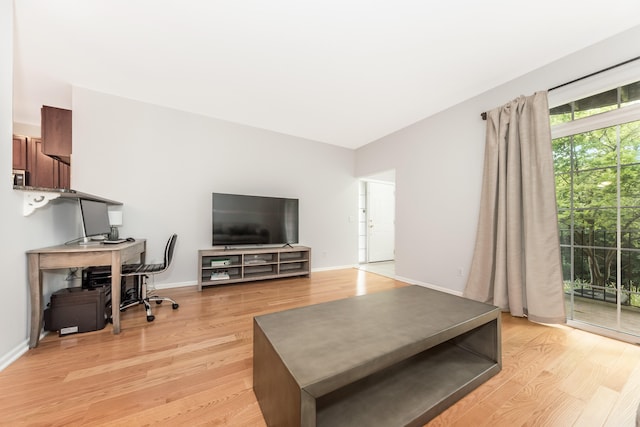 241 W Oakbrook Dr, Ann Arbor, MI 48103 - living area featuring light wood-type flooring and an office area