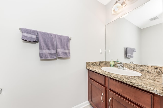 241 W Oakbrook Dr, Ann Arbor, MI 48103 - bathroom featuring vanity and baseboards