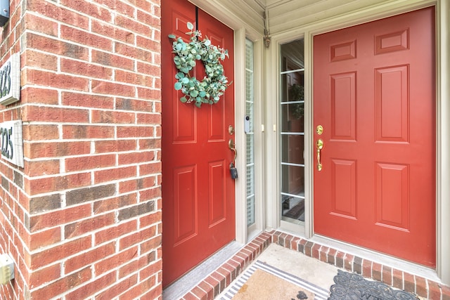 225 W Oakbrook Dr, Ann Arbor, MI 48103 - entrance to property featuring covered porch and brick siding