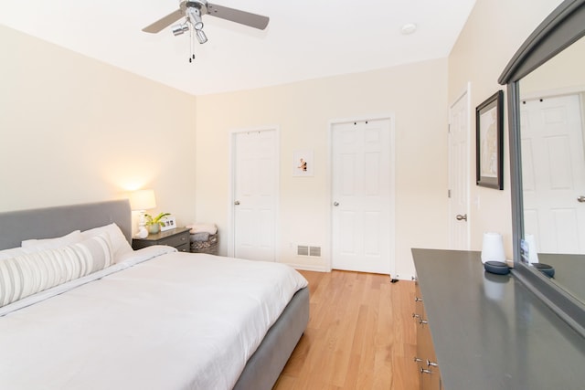 225 W Oakbrook Dr, Ann Arbor, MI 48103 - bedroom with light wood-style flooring and a ceiling fan