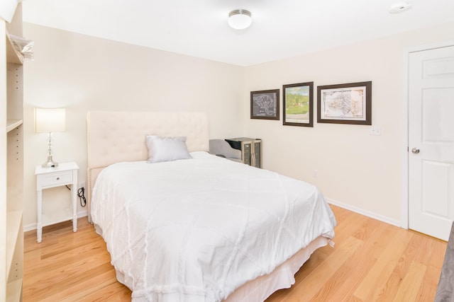 225 W Oakbrook Dr, Ann Arbor, MI 48103 - bedroom featuring light wood-type flooring