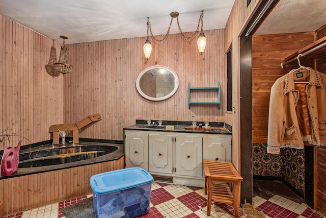 2597 E Glendora Rd, Buchanan, MI 49107 - bathroom with wooden walls and double vanity