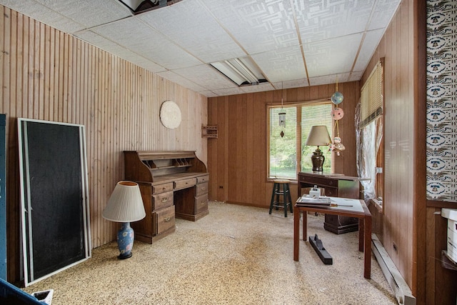 2597 E Glendora Rd, Buchanan, MI 49107 - office area featuring a baseboard radiator and wood walls