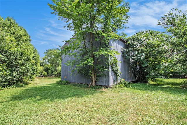 2597 E Glendora Rd, Buchanan, MI 49107 - view of grassy yard featuring an outdoor structure